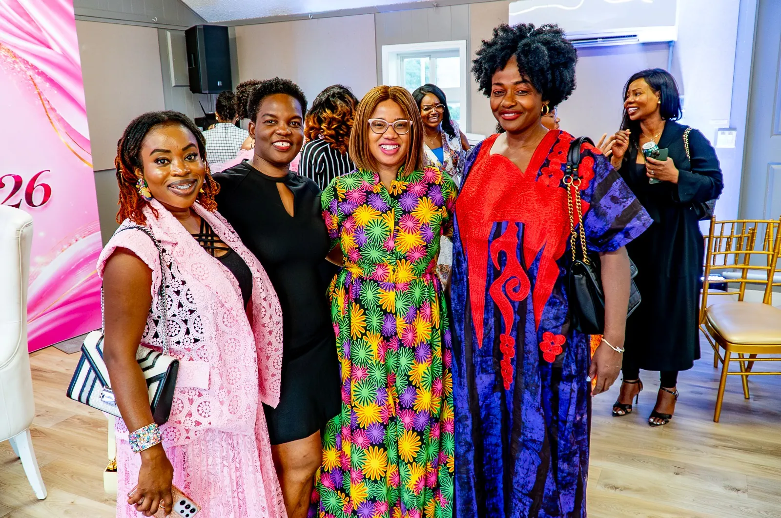 A group of women smiling together at a church gathering